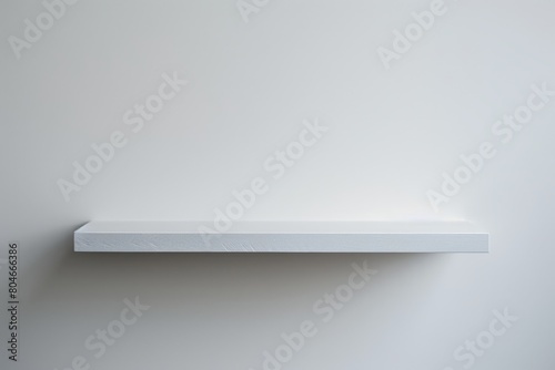 Wallpaper Mural Closeup of a white empty shelf mounted on a light gray wall in a minimalist setting Torontodigital.ca
