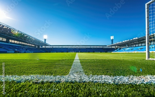 Unique perspective of a soccer stadium as seen from the goal line, capturing the expanse of the pitch