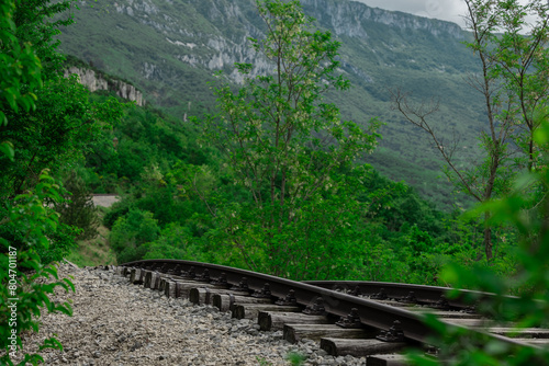 Pijana pruga or drunk railway in Istria, Croatia. A stretch of neglected railway track and bed, deformed rails, washed down by land slide or poor earth base photo