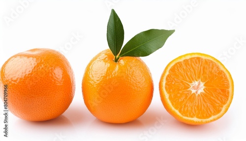 three oranges with a leaf on top and a slice missing