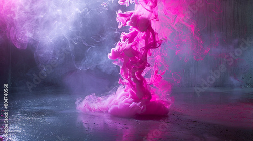 Bold neon pink smoke curls and twirls against a slate gray floor. photo