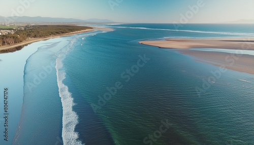 blue waves of water of the river and the sea meet each other during high tide and low tide