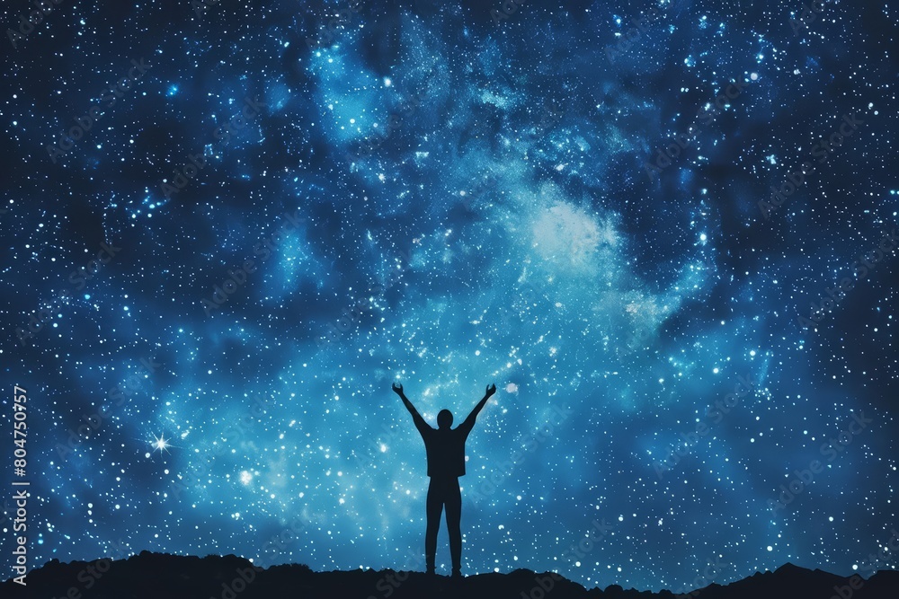 Obraz premium Lost in the beauty of the cosmos, a solitary figure stands in awe beneath a resplendent night sky, arms raised in reverence to the celestial tapestry above.