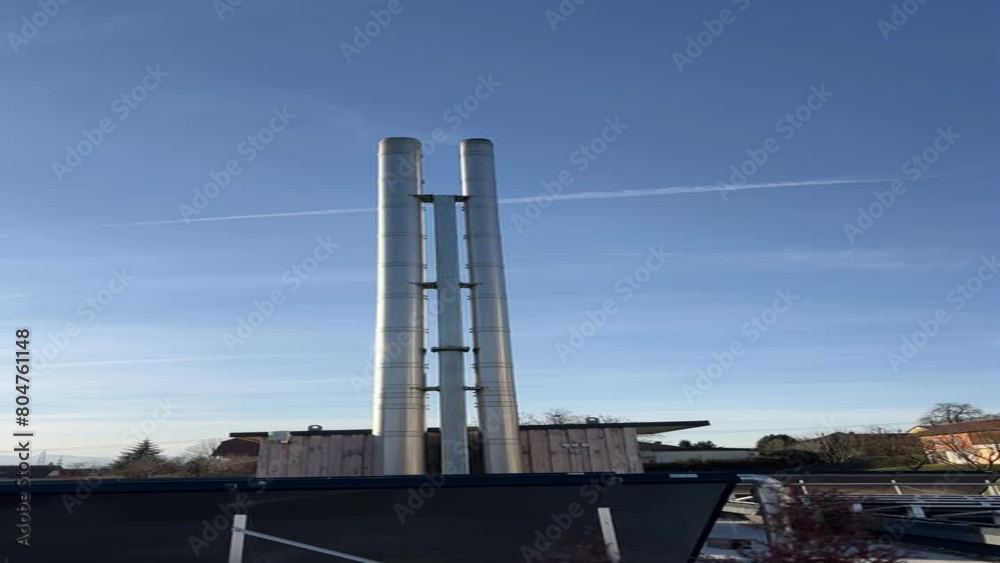 smoking chimney of pellets district heating plant smoking chimney of pellets district heating plant