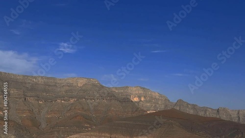 Landscape of Oman mountains, Arabian Peninsula.  Jebel Shams mountains (Mountain of Sun) and gorge in Oman at sunrise. High quality foto photo