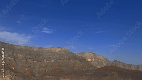 Landscape of Oman mountains, Arabian Peninsula.  Jebel Shams mountains (Mountain of Sun) and gorge in Oman at sunrise. High quality foto photo