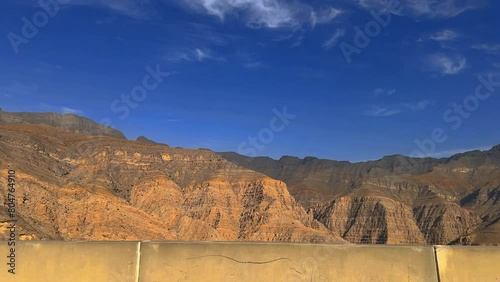 Landscape of Oman mountains, Arabian Peninsula.  Jebel Shams mountains (Mountain of Sun) and gorge in Oman at sunrise. High quality foto photo