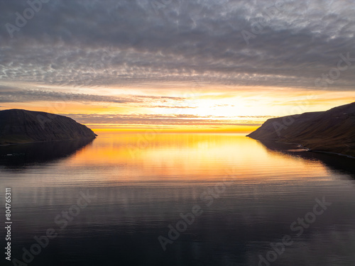 the sunset of Flateyri in the westfjords Iceland photo