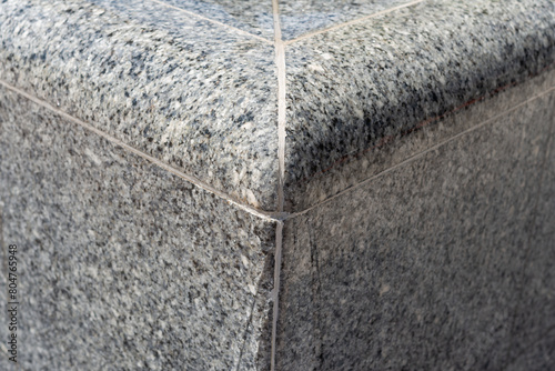sleek and polished gray granite used in a water feature