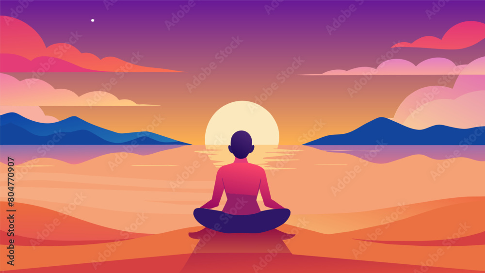 A soothing picture of a person meditating on a sandy beach with a vibrant sky of pink and orange hues as the backdrop..