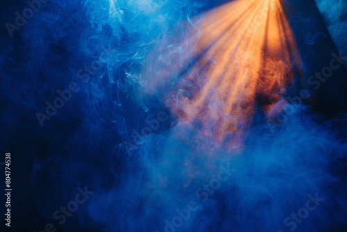 Royal blue smoke wafts over a stage under a sun-yellow spotlight, casting a warm glow against a deep navy background. © Naeem