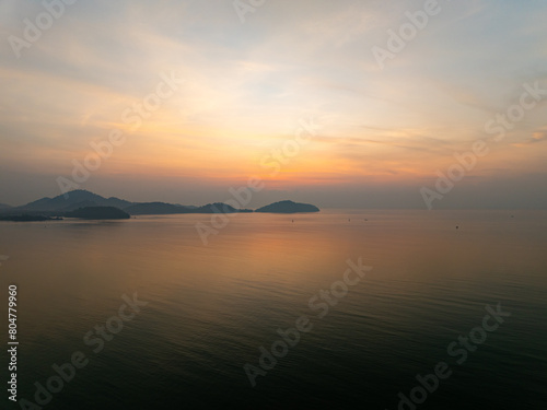 Aerial view sunset sky,Nature beautiful Light Sunset or sunrise over sea,Colorful dramatic majestic scenery sunset Sky with Amazing clouds and waves in sunset sky nature light cloud background