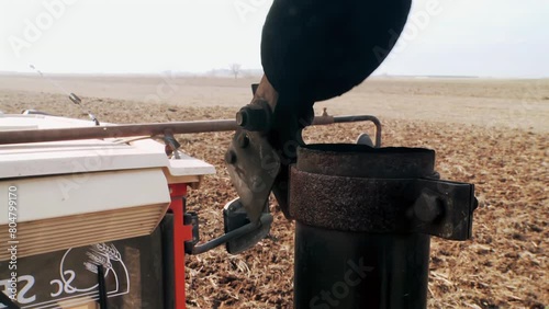 View of Tractor Exhaust Pipe while Starting an Old Tractor in the Field. Close up. 4K Resolution.
