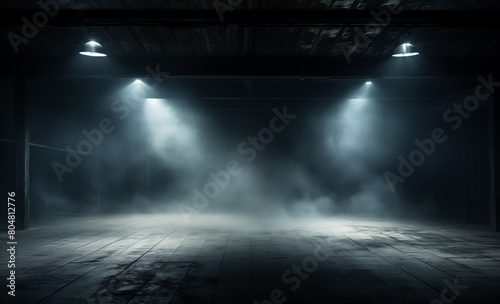 An empty room filled with smoke under the lights