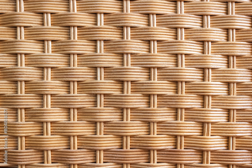 Texture of rattan furniture close-up. Abstract wooden background. Selective focus