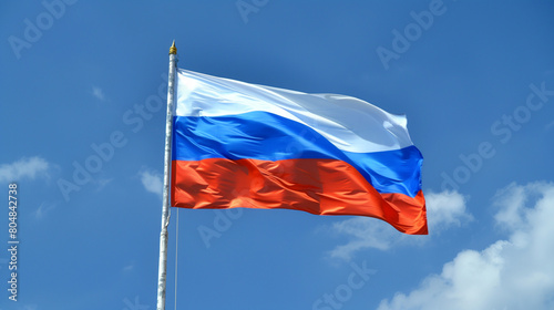 An illustration of the Russian flag fluttering against a clear blue sky. The flag consists of three horizontal stripes: white on the top, blue in the middle, and red on the bottom. Its movement 