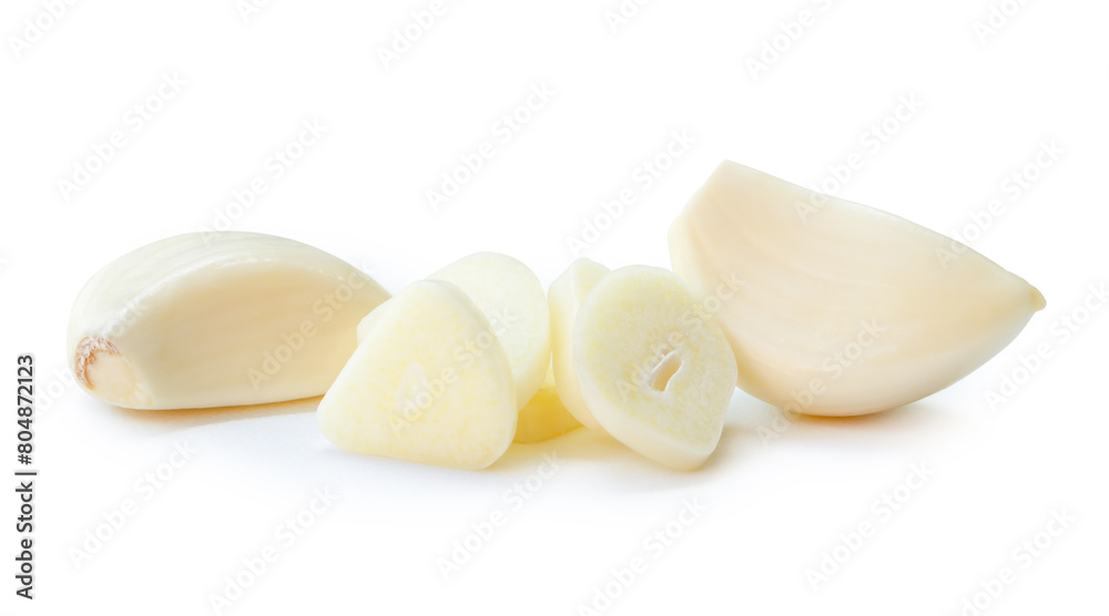 Top view of peeled garlic cloves with slices in stack isolated on white background with clipping path Top view of peeled garlic cloves with slices in stack isolated on white background with clipping path