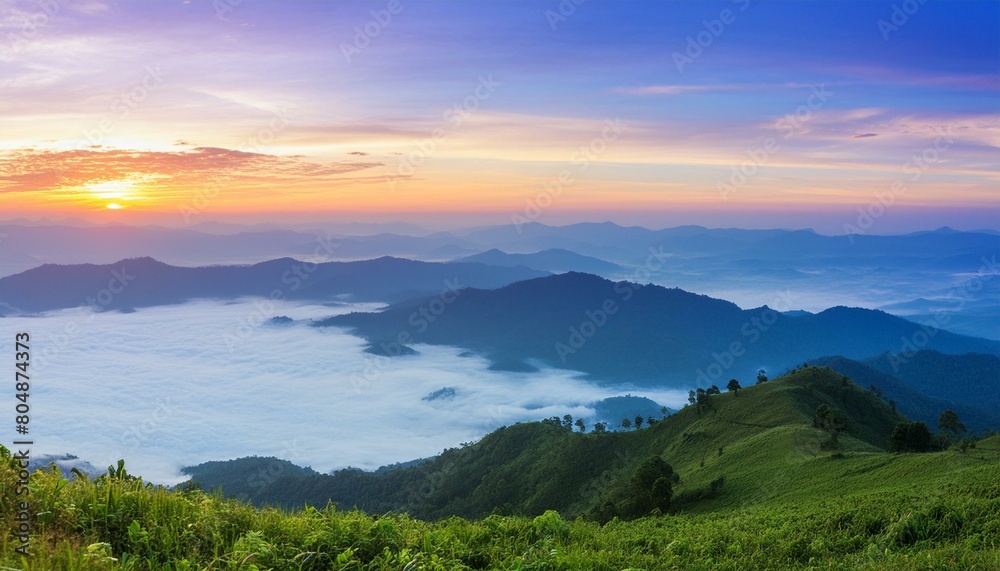 green mountain with fog and sunrise twilight sky at background green mountain with fog and sunrise twilight sky at background