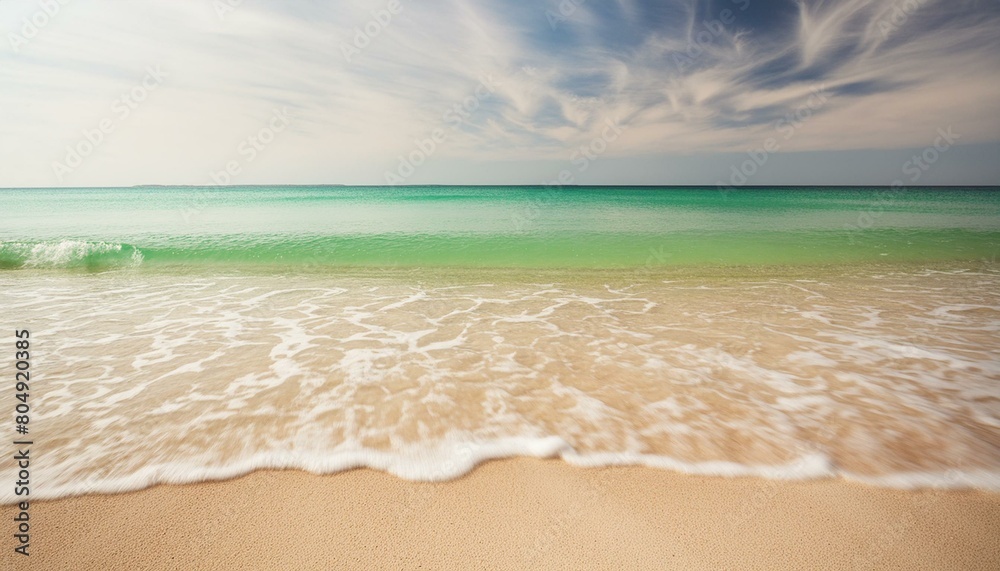 soft glittering green sand and turquoise water waves; beautiful seascape