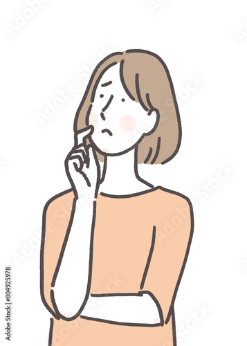 悩みを抱えている女性 photo