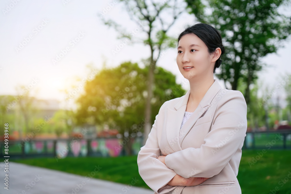 Confident Businesswoman Ready for Success at Sunset Confident Businesswoman Ready for Success at Sunset