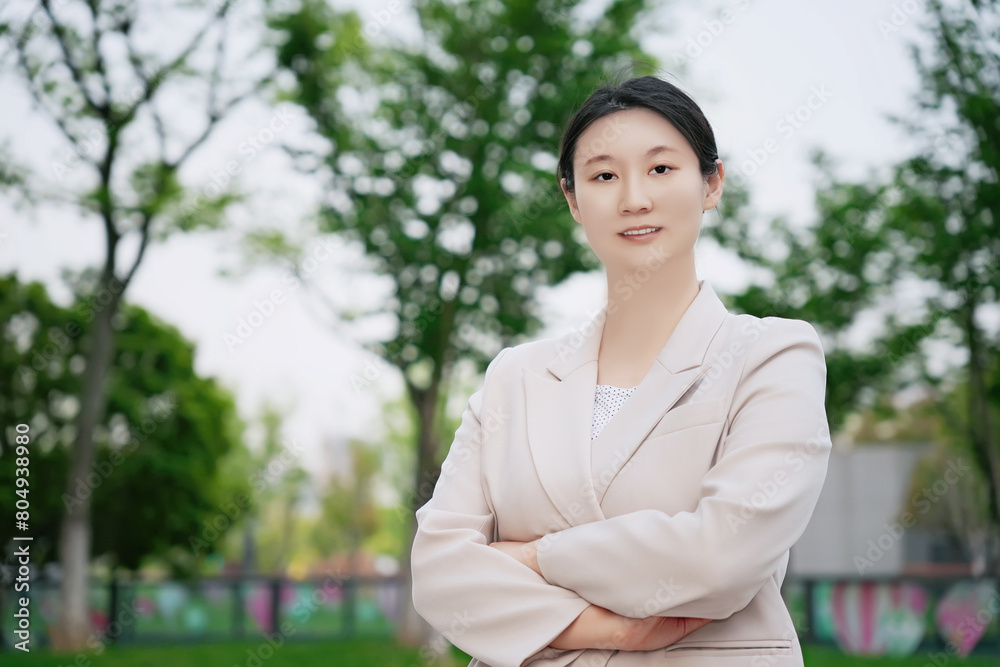 Confident Professional Woman Posing in Outdoor Setting Confident Professional Woman Posing in Outdoor Setting