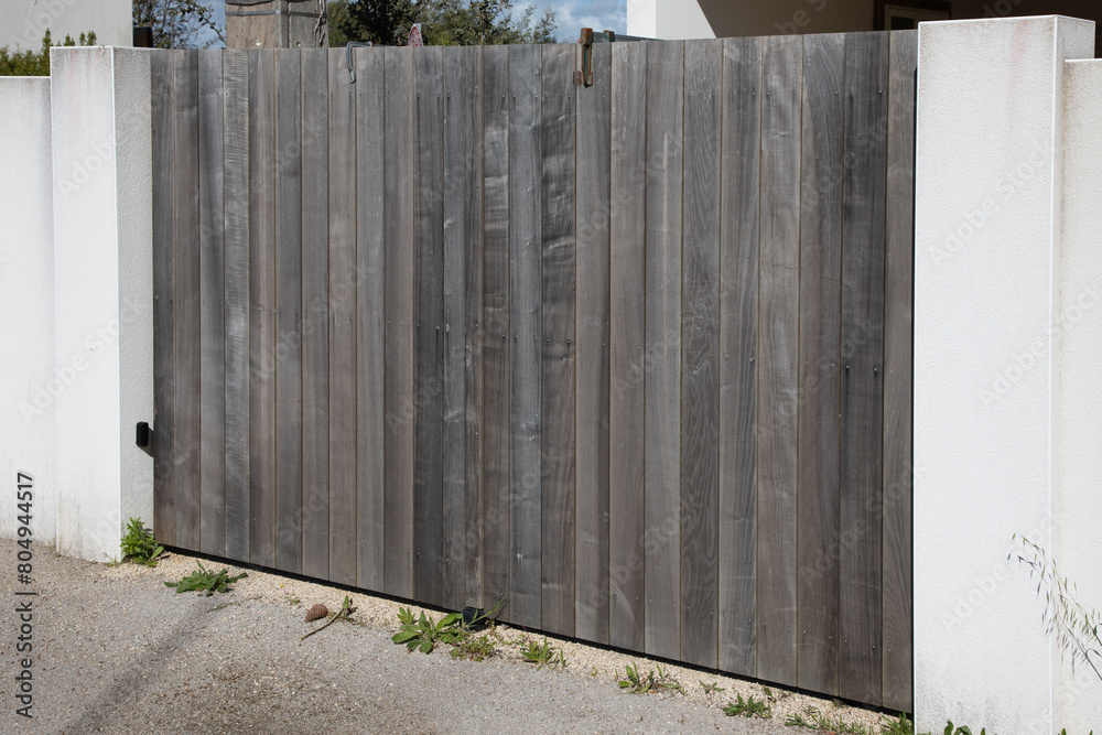 portal high wooden gate facade in street view outdoor home door entrance portal high wooden gate facade in street view outdoor home door entrance