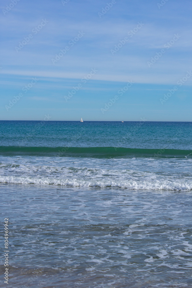 sea view with a sailboat