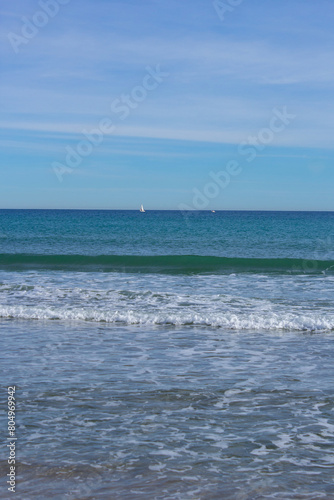 sea view with a sailboat