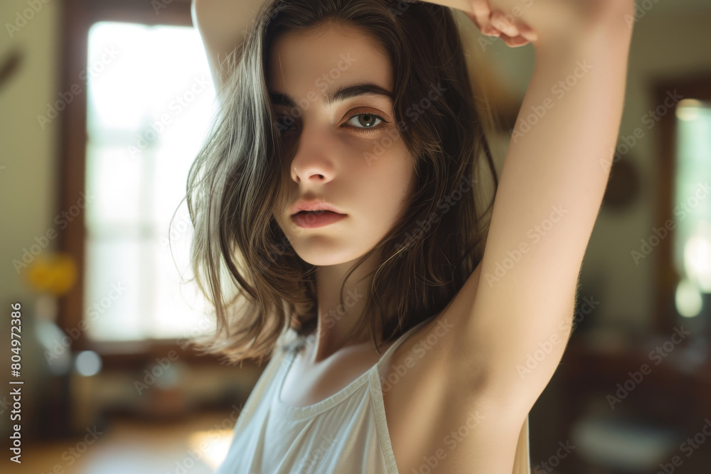 Relaxed and effortless pose of a young adult model Relaxed and effortless pose of a young adult model