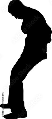 Silhouette of a man leaning against a wall.