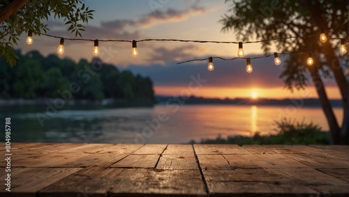 mpty Wood table top with decorative outdoor string lights hanging on tree in the garden , Daylight saving time end, real estate concept and blurred landscape of river beach Blue sky with sunset photo