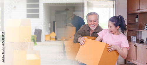 Moving day concepts, Asian family carrying boxes into a new home, Happiness middle-aged daughter son and senior father in a new house photo