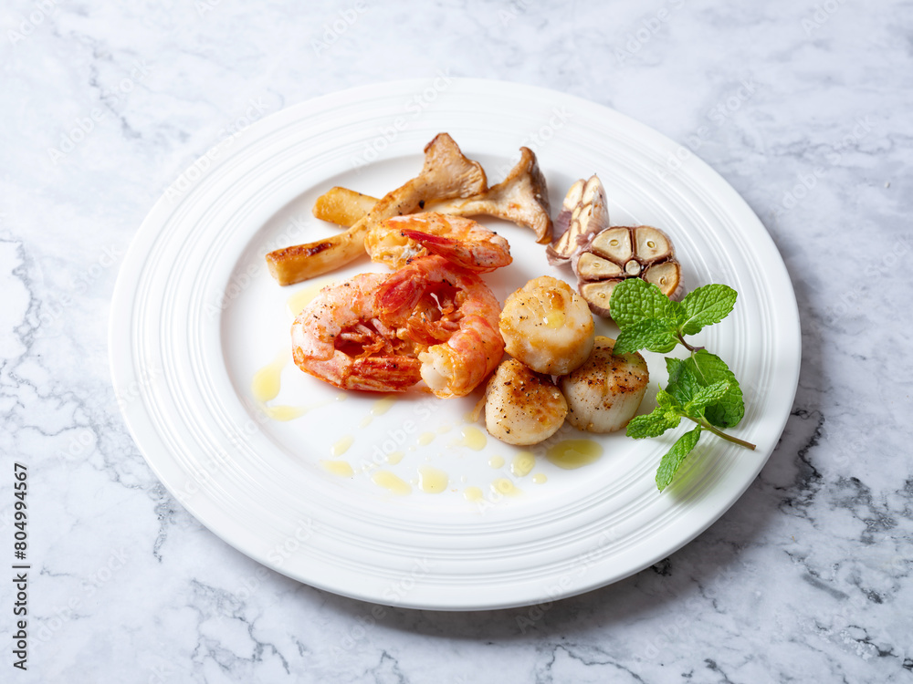 Grilled shrimp and scallops on a plate Grilled shrimp and scallops on a plate