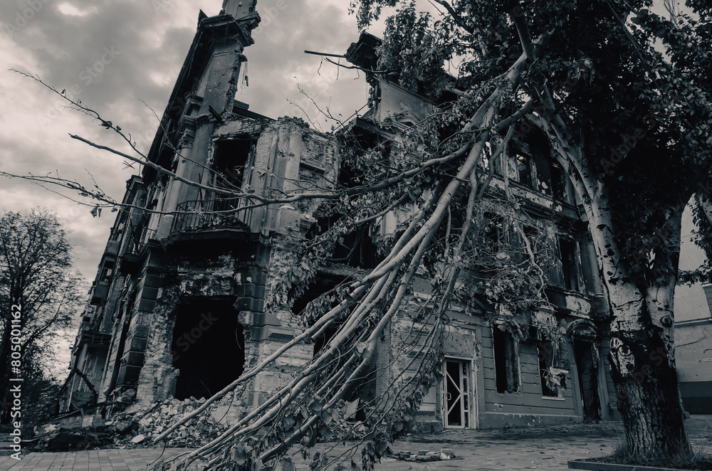 Fototapeta premium destroyed and burned houses in the city during the war in Ukraine