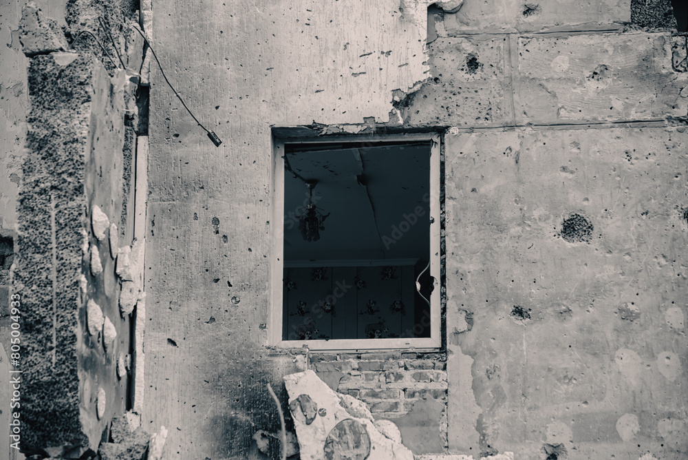 destroyed and burned houses in the city during the war in Ukraine