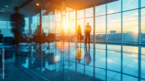 long exposure shot of a crowd of business people walking in a bright office lobby, fast-moving with blurriness. 