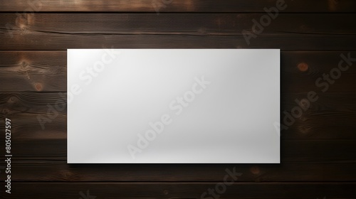 Empty paper mockup against a dark wooden backdrop © Visual Aurora