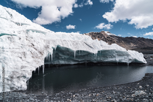 pastoruri glacier landscape with a laguna in snow covered andes in the national park Huascarán photo