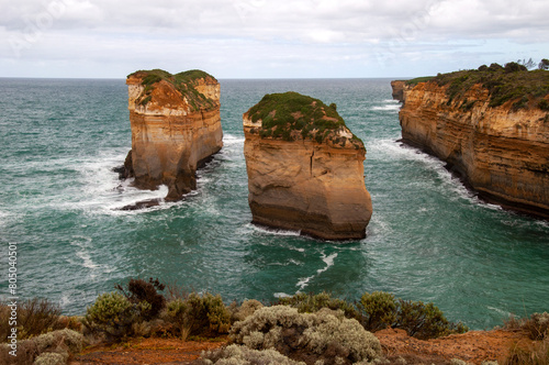 Port Campbell Australia, 2 of the 12 apostles in afternoon light on a cloudy day photo