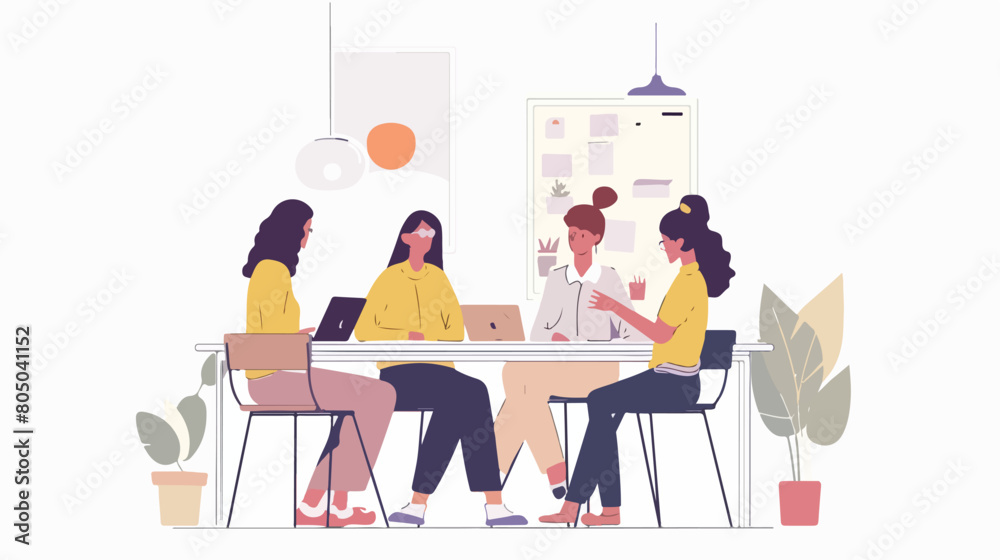 Female designer having a meeting with her team in an