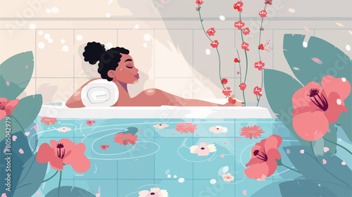 Beautiful young woman taking bath with flowers in spa