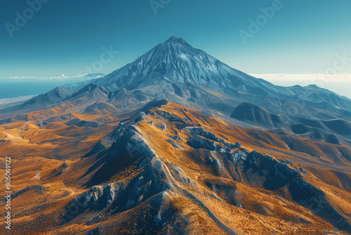 Aerial shot of vibrant volcanic mountains under a clear blue sky. AI generated.