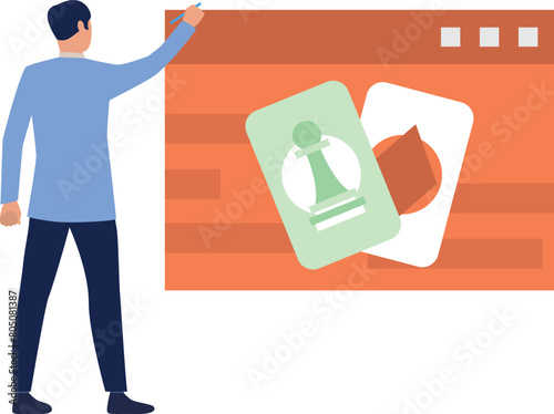 Boy pointing at card game on web page.
