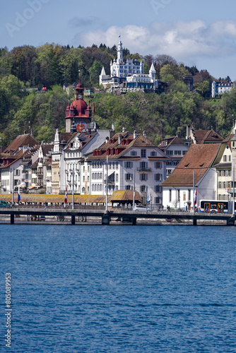 Scenic view of Swiss City of Lucerne seen from passenger ship on Lake Lucerne on a sunny spring noon. Photo taken April 11th, 2024, Lucerne, Switzerland.