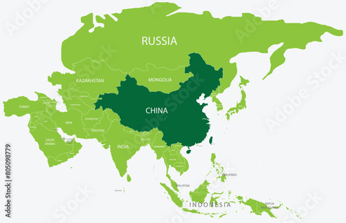 Highlighted green map of CHINA inside light green political map of Asia using orthographic projection on light blue background