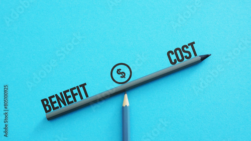 Benefit and cost is shown using the text on the scales photo