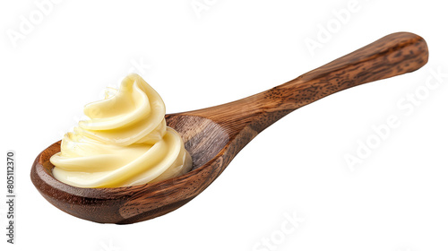 mayonnaise-like sauce on wooden spoon close-up with cut out background