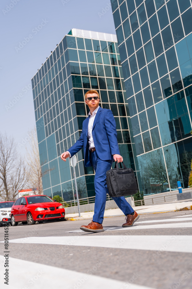 Cool businessman crossing the street in the city Cool businessman crossing the street in the city