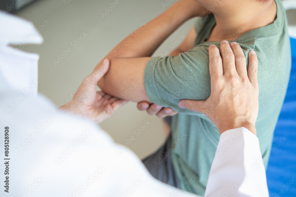 man was admitted for treatment of muscle pain in back of his shoulder due to working hard and causing muscle inflammation. doctor is treating man muscle pain in his back and shoulders due to overwork. man was admitted for treatment of muscle pain in back of his shoulder due to working hard and causing muscle inflammation. doctor is treating man muscle pain in his back and shoulders due to overwork.